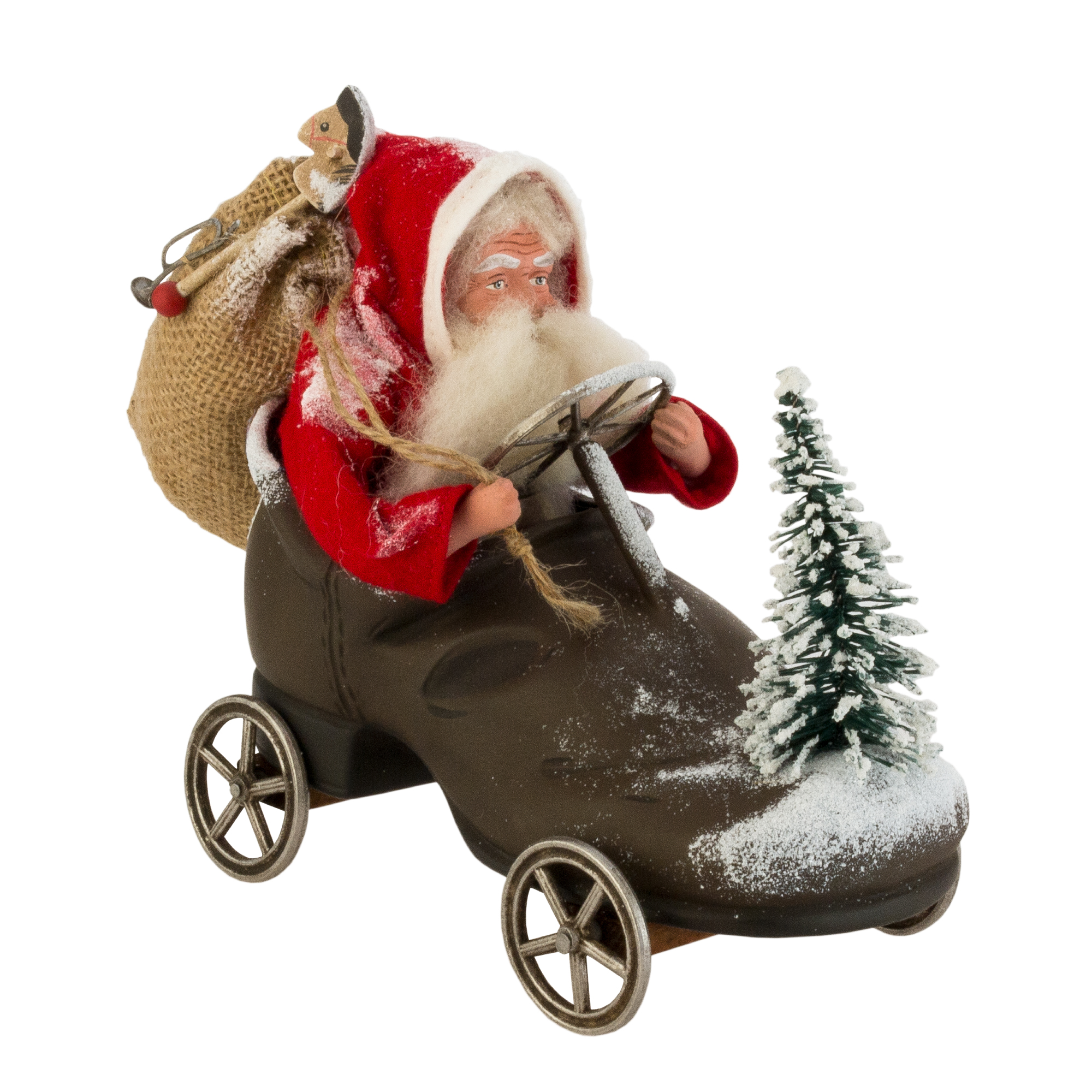 Dressed Santa Claus sitting in a shoe with wheels, feather tree and sack with toys,  L = 9 inch , H = 6.7 inch