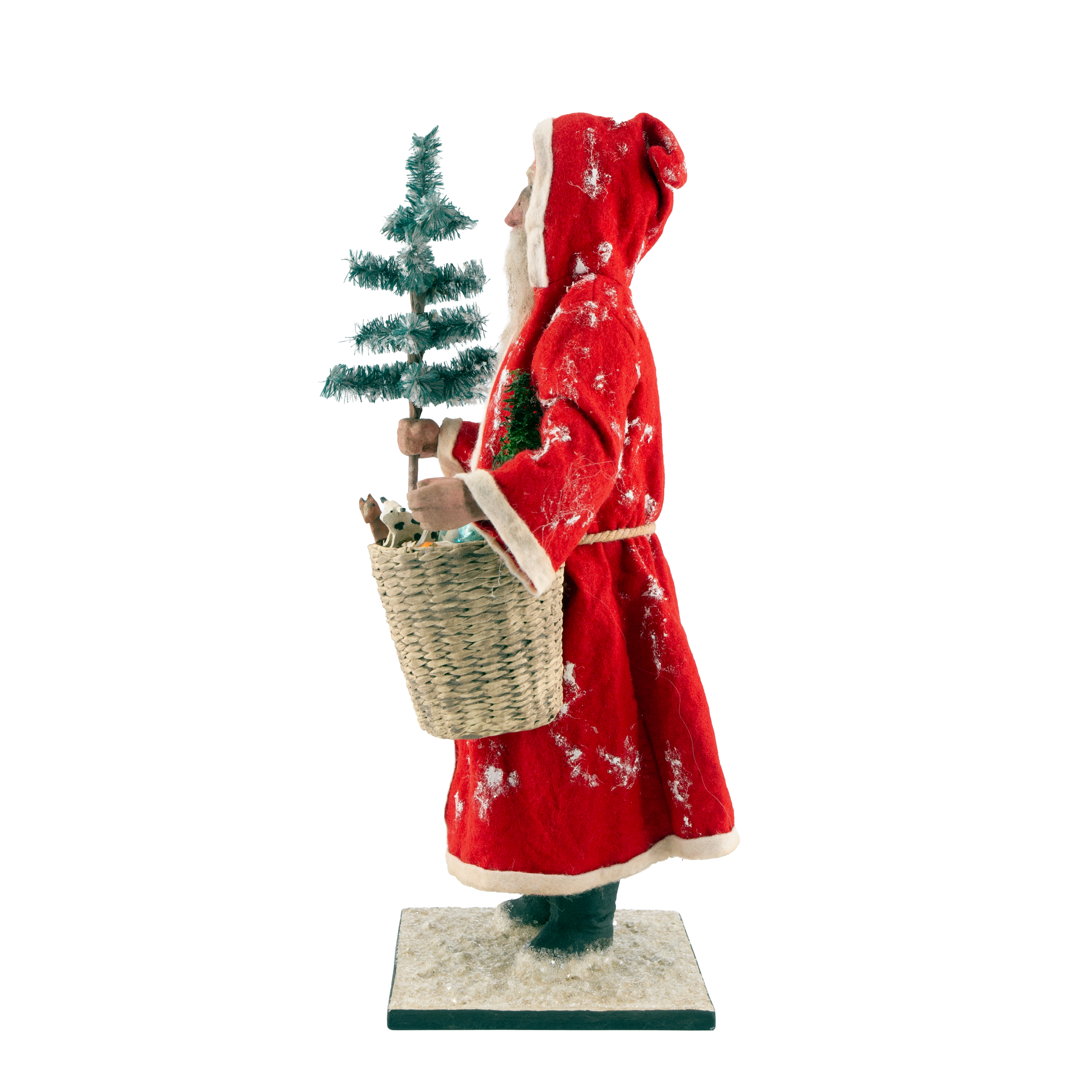 Rote Weihnachtsmann-Figur mit Baum und Korb, seitlich